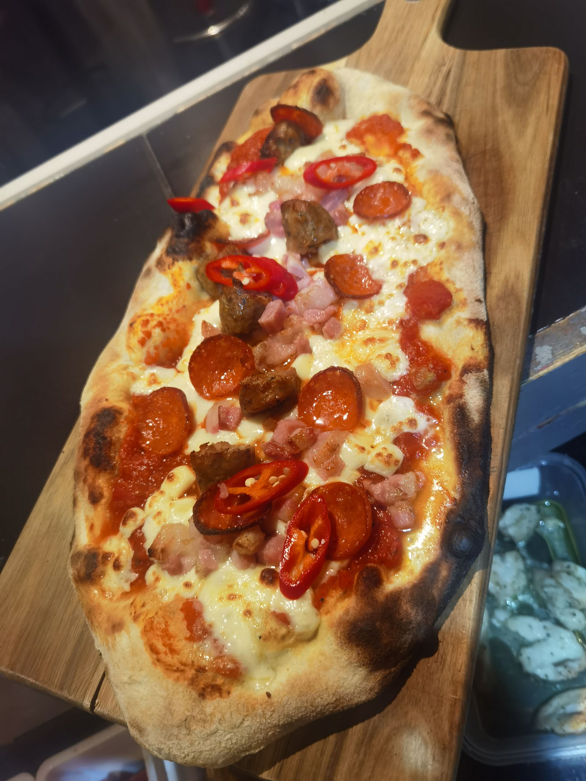 A stretched-to-order pizza at il Piatto